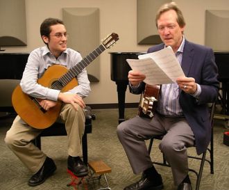 Guitarist Douglas Niedt teaching a classical guitar master class in St. Louis