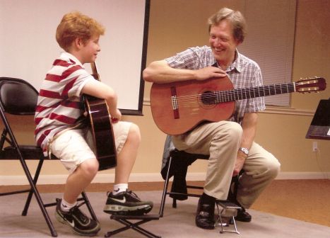 Guitarist Douglas Niedt teaching a classical guitar master class at Elon University North Carolina